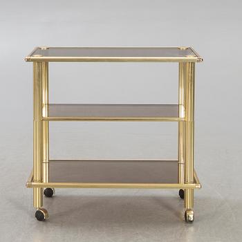 A brass serving trolley later part of the 20th century.
