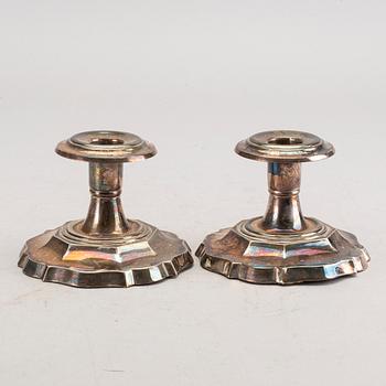 A set of three pair of Swedish 20th century silver candle sticks.