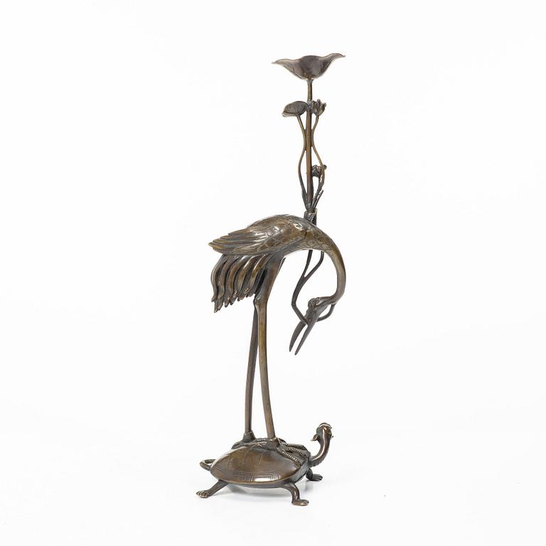 A bronze candle holder, Japan, 20th century.
