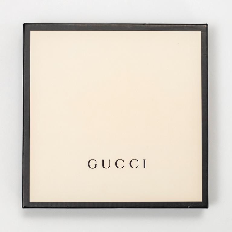 Gucci, a 'Flora' silk scarf.
