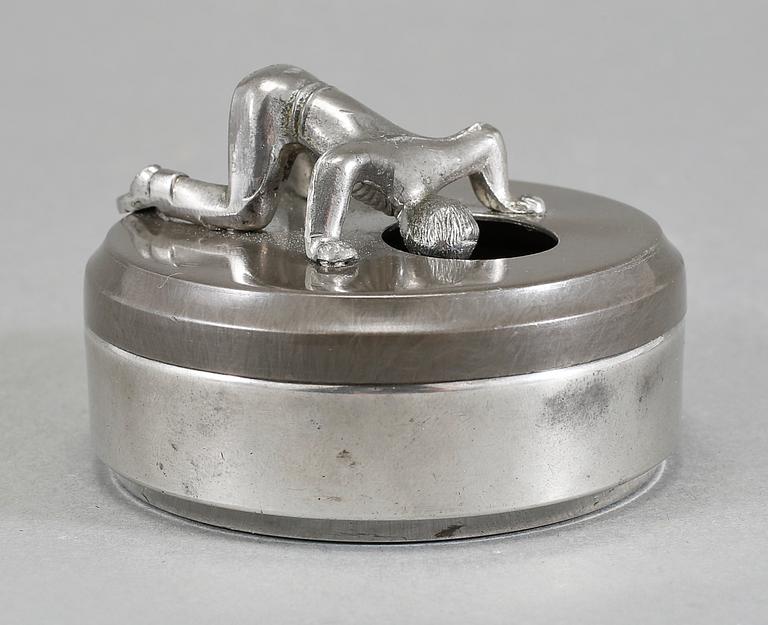 MANSCHETTKNAPPSASK, tenn och vitmetall, "Originell", Widerholm & Dahlberg, Eskilstuna, 1930-/40-tal.