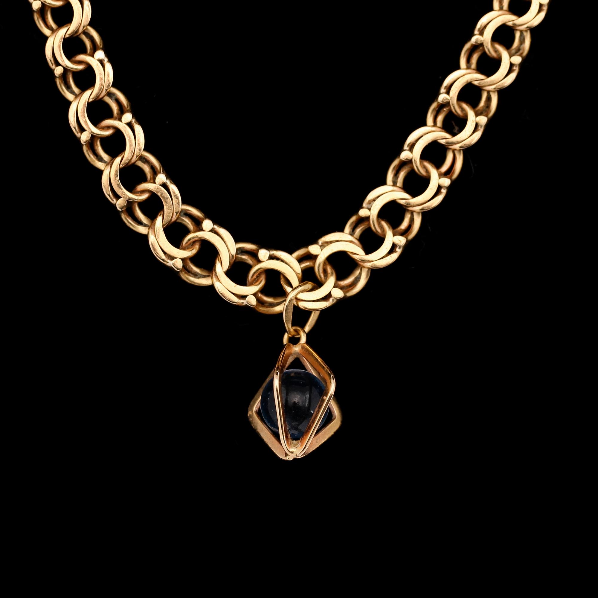 COLLIER MED HÄNGE, 18K guld, svenska stämplar, 1955. Total vikt ca 16 g.