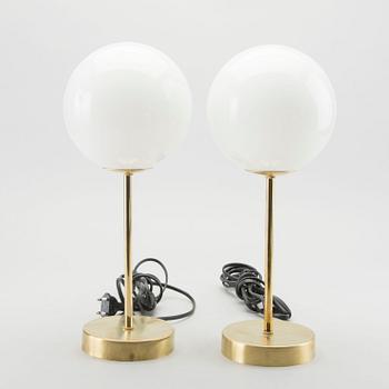 A pair of modern table lamps.