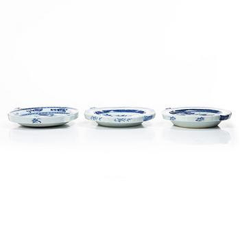 A group of three Chinese blue and white porcelain hot water dishes, Qing dynasty, 18/19th century.