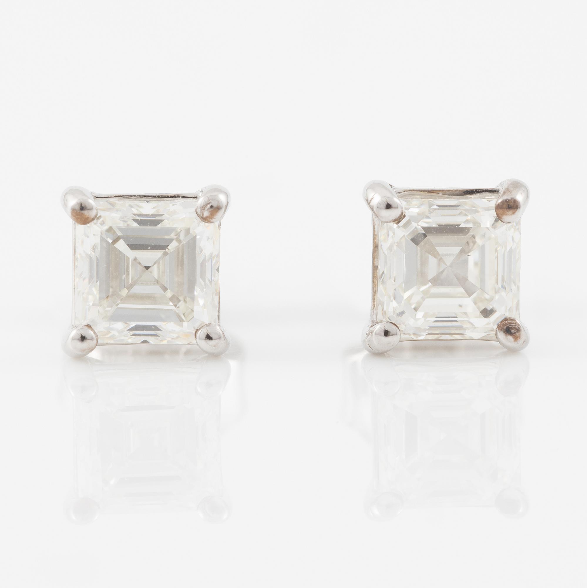 Earrings, a pair, 18K white gold with emerald-cut diamonds, accompanying GIA dossier.