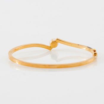 Armring, 18K guld och pärla, Stigbert, Stockholm, 1964.