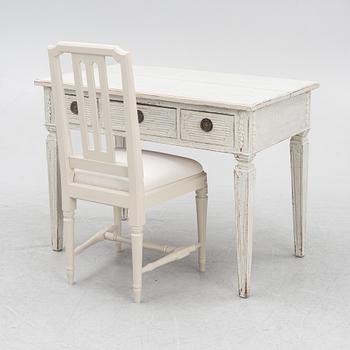 A late 19th century desk and an "Odenslunda" chair from IKEAs 18th century series.