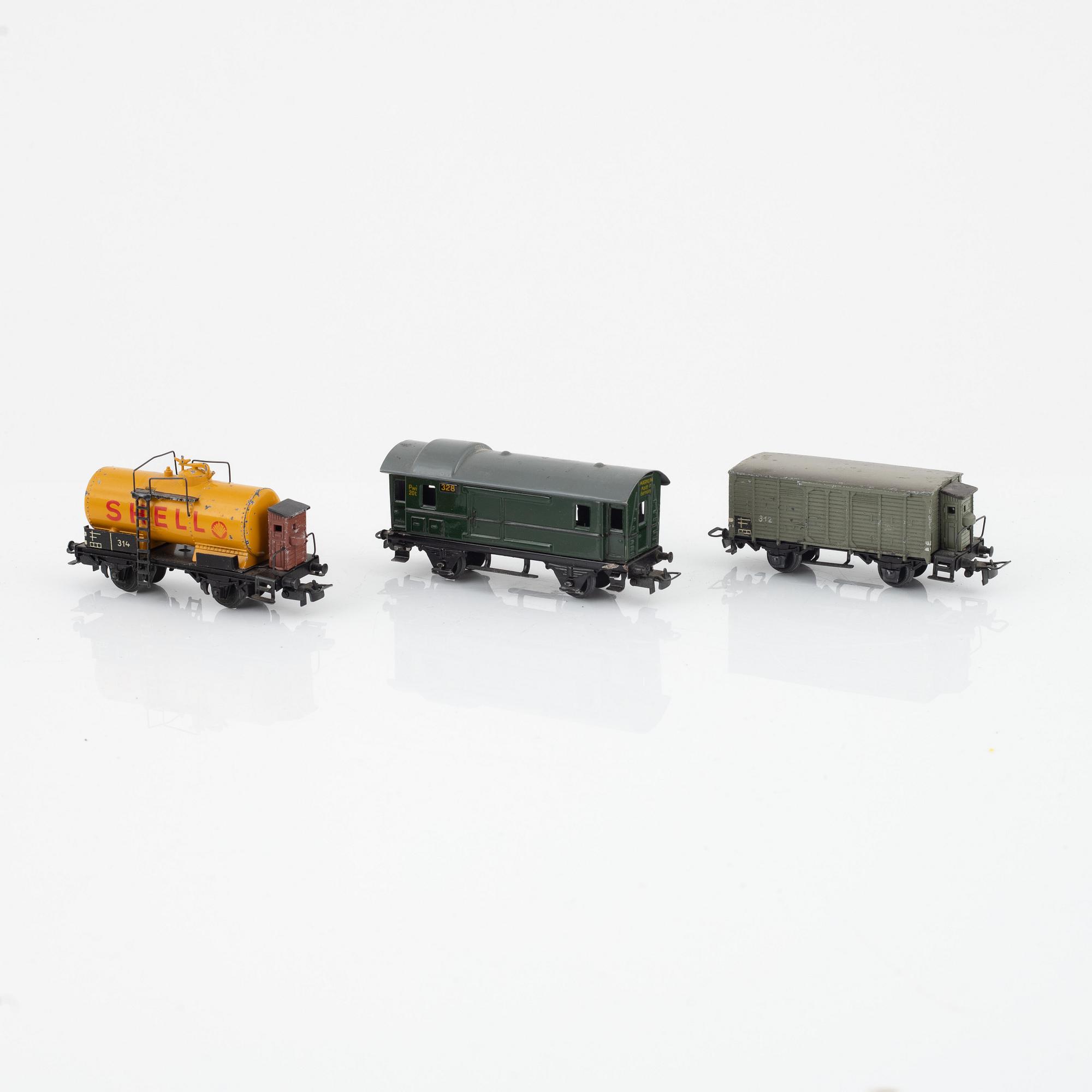 Märklin, two electric locomotives, model 3528 and 3338, and six cargo cars, gauge H0.