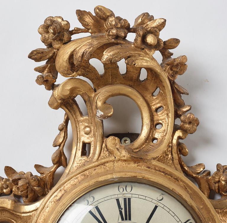 A Swedish rococo wall clock by Olof Berg, second half of the 18th century.