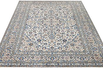 A Kashan carpet, c. 355 x 238 cm.