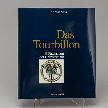 A set of 5 watch books.