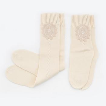 Christian Dior, two pairs of wool socks.