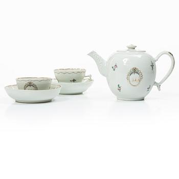 Cups and saucers, 11+7, and a teapot in famille rose with monogram, company porcelain, China, 18th century.