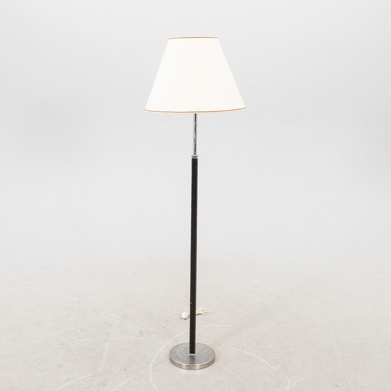 A Philips leather and chrome floor lamp model no 590A later part of the 20th century.