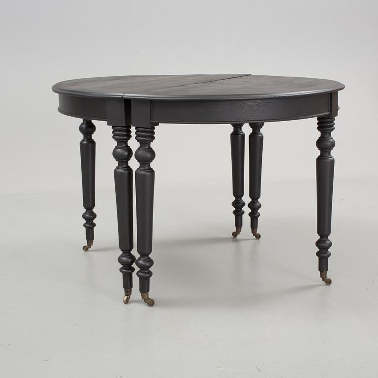 A mid 19th century dining table.