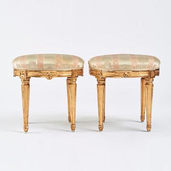 A pair of Gustavian stools.