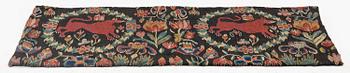 A cushion, 'Red Lion' (Rött Lejon), tapestry weave, ca 86 x 36 cm, southwestern Scania, first part of the 19th century.