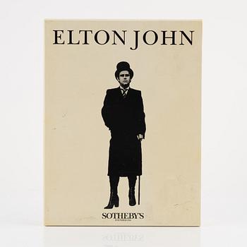 Elton John, jacka, Kansai International, samt katalog Sothebys Elton John Collection.