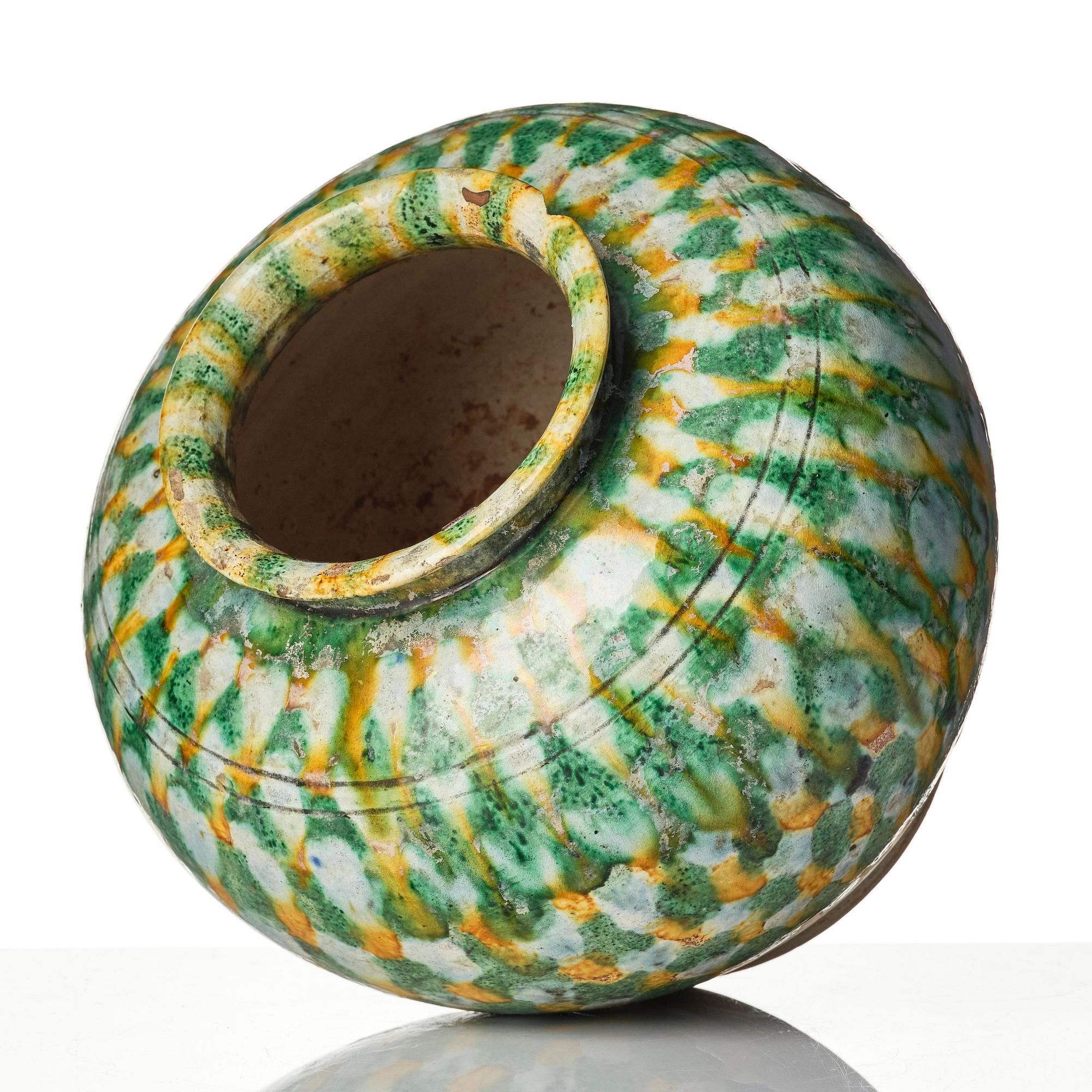 A sancai-glazed pottery jar, Tang dynasty (618-907).