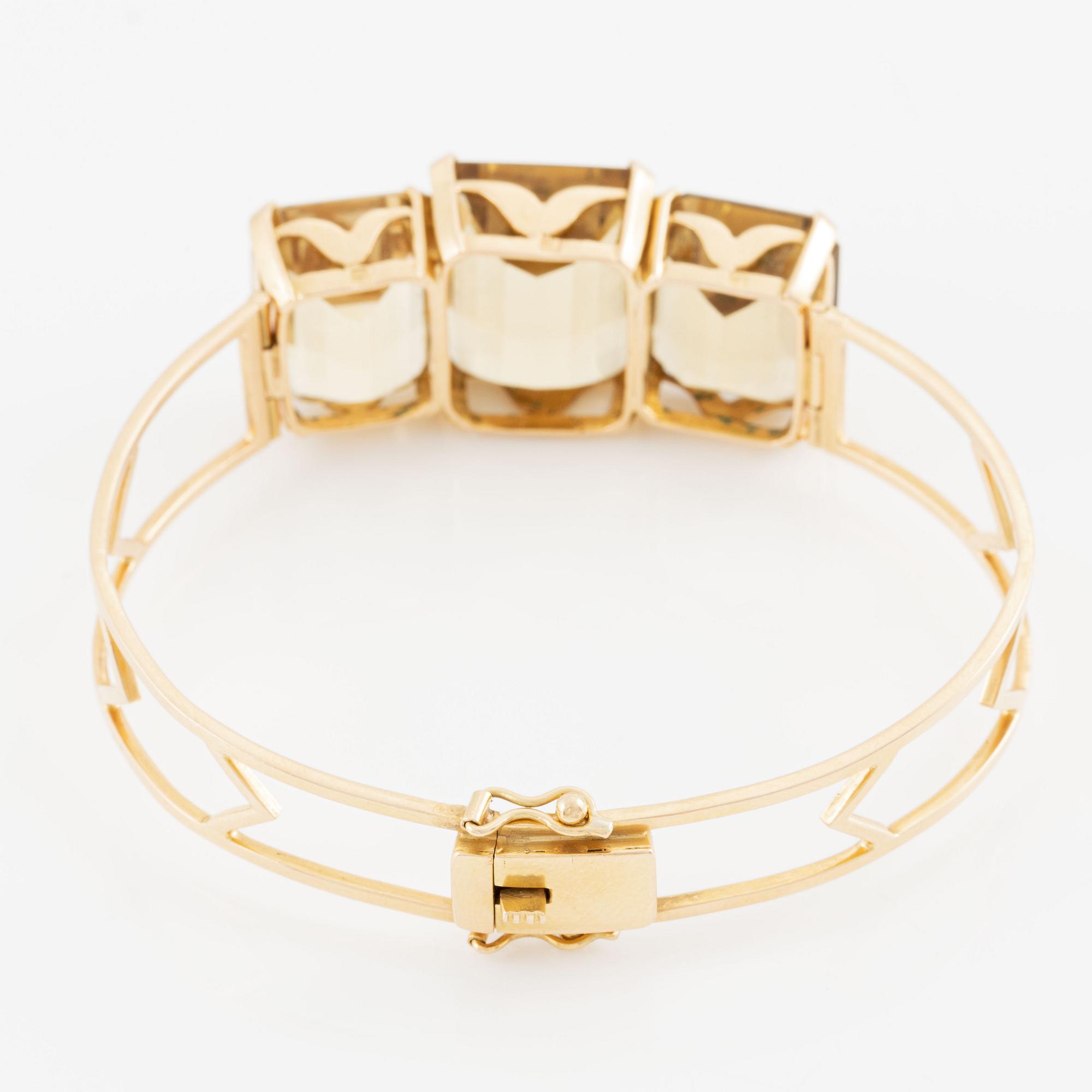 Armband 18K guld med fasettslipad kvarts.