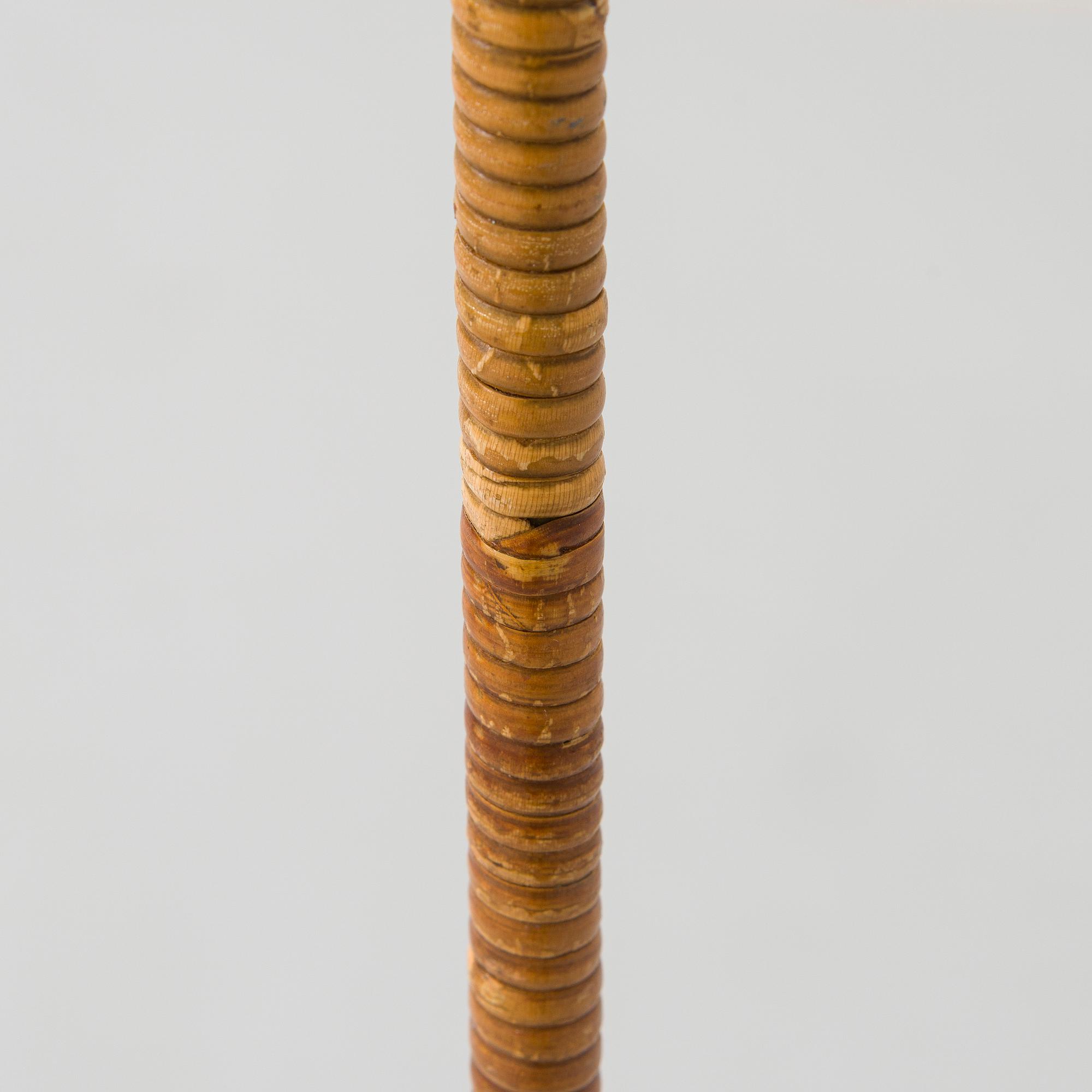 Paavo Tynell, a mid-20th century K10-10 floor lamp for Taito.
