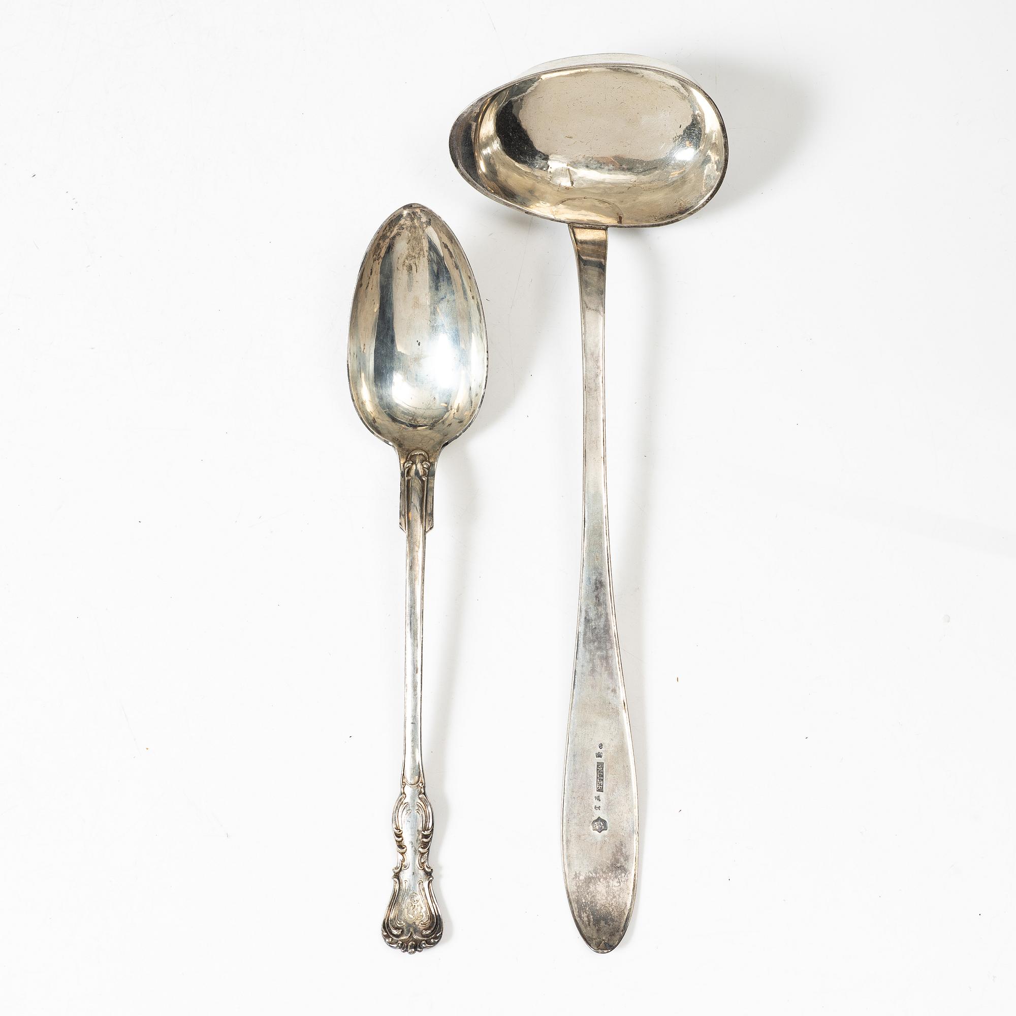 A Swedish silver soup ladle and a serving spoon, 19th Century.