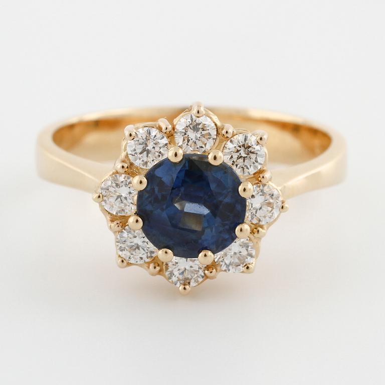 A sapphire and brilliant cut diamond ring.