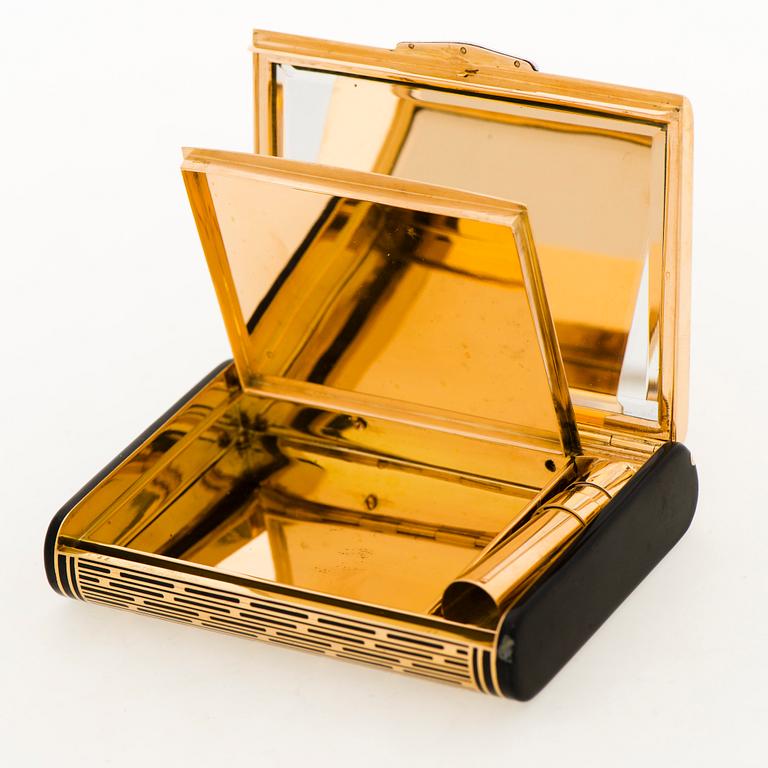 A CARTIER VANITY CASE, 18K gold, enamel, rose cut diamonds. 1930s.