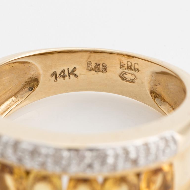 Ring, 14K guld med små diamanter och gula färgade stenar.