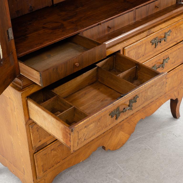 A Swedish rococo cabinet, mid 18th Century.