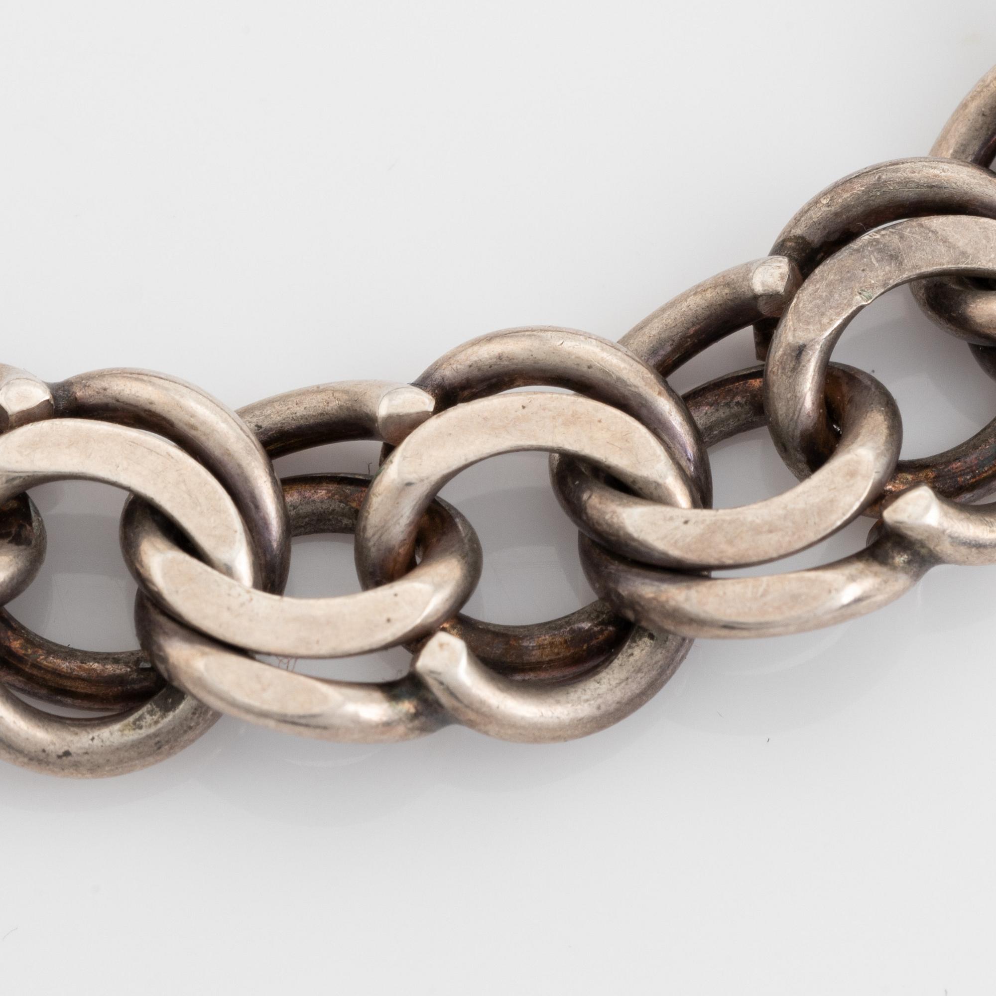 Silver bracelet.