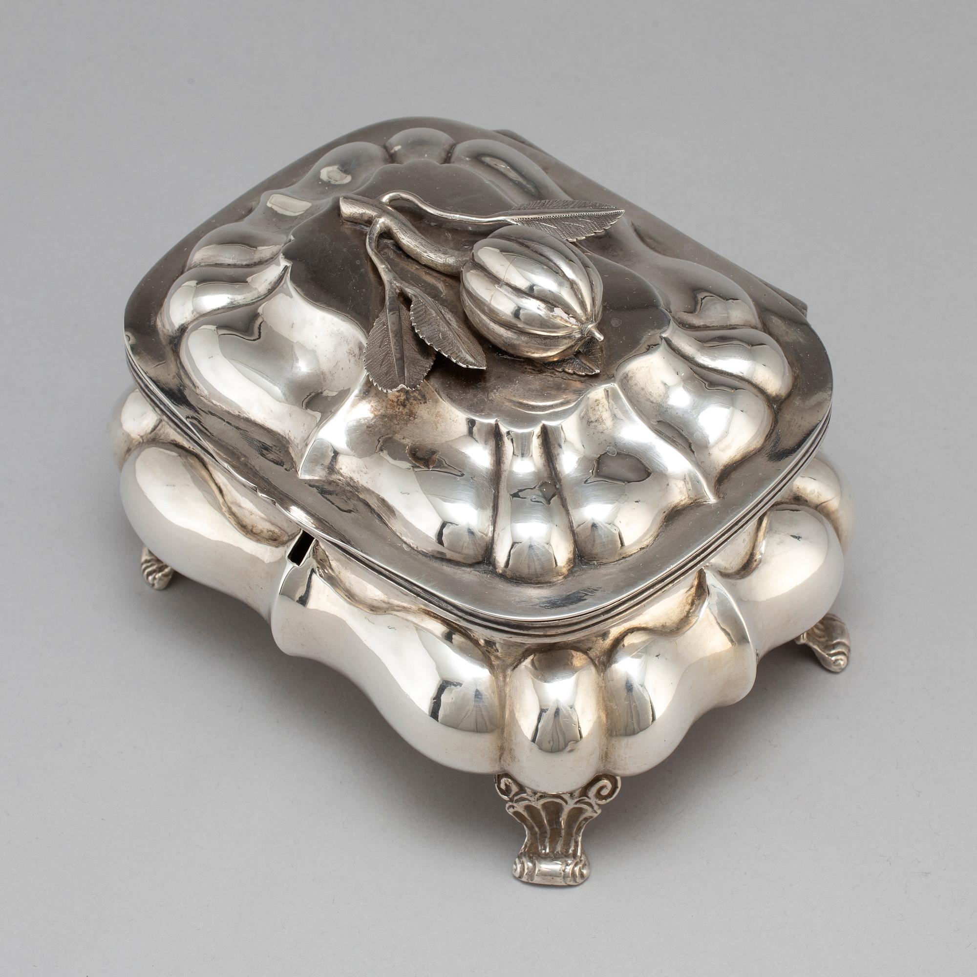 A Russian 19th century parcel-gilt silver sugar-casket, unidentified makers mark, possibly Pskov 1863.