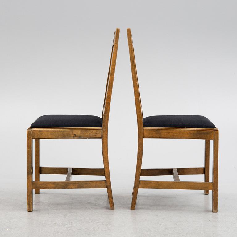 Carl Westman, attributed, a pair of stained birch wood chairs. Early 20th century.