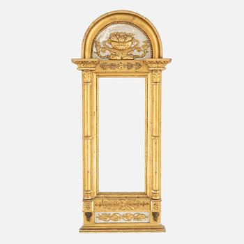 A lat Gustavian mirror from around  the year 1800.