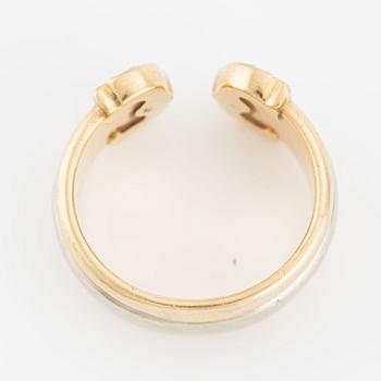 Cartier ring "Double C" 18K trefärgat guld med runda briljantslipade diamanter.
