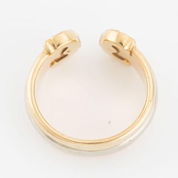 Cartier ring "Double C" 18K trefärgat guld med runda briljantslipade diamanter.