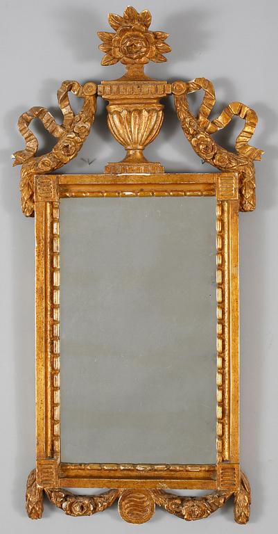 A mirror in gustavian style, made around year 1900.