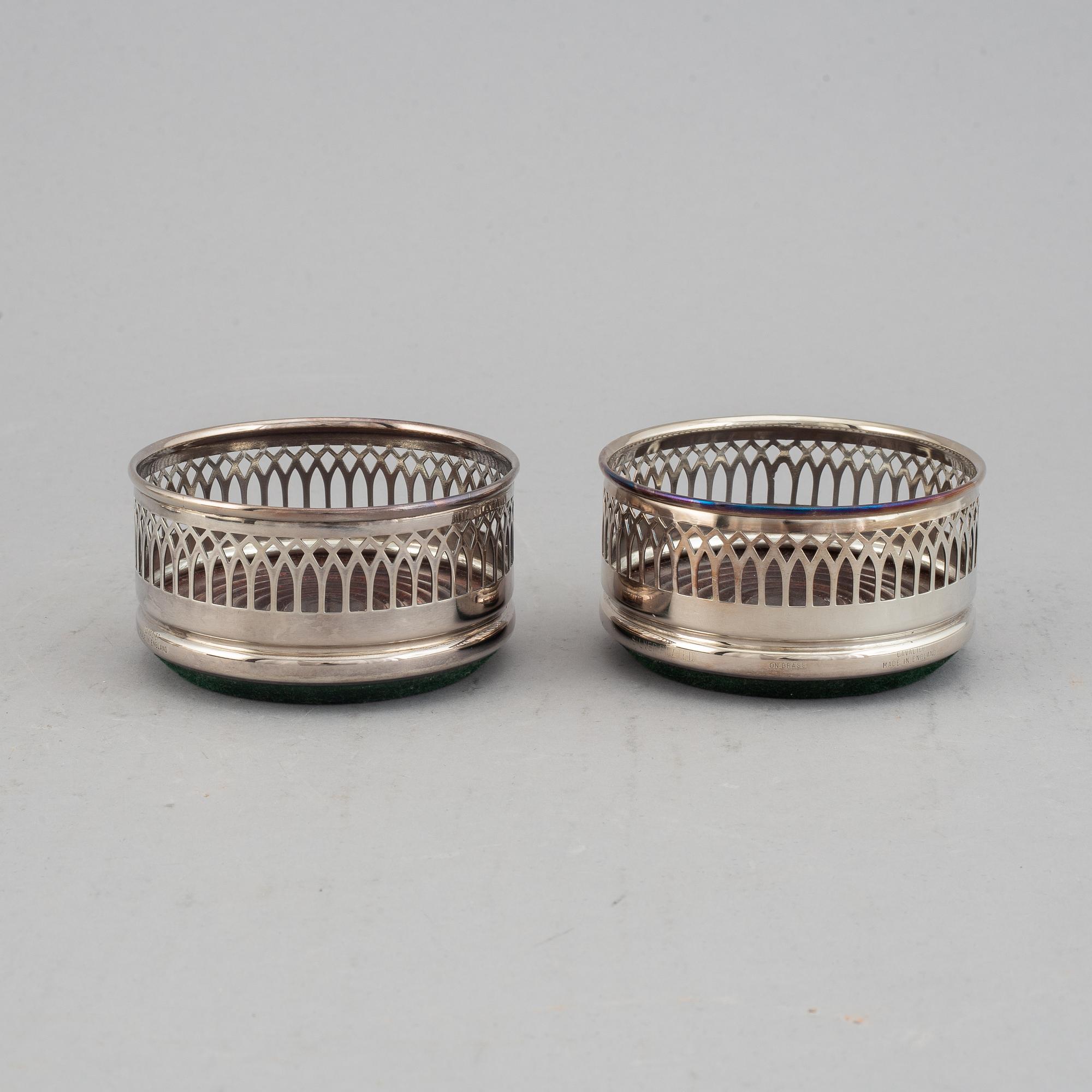 Coasters, two pairs, silver plate, England.