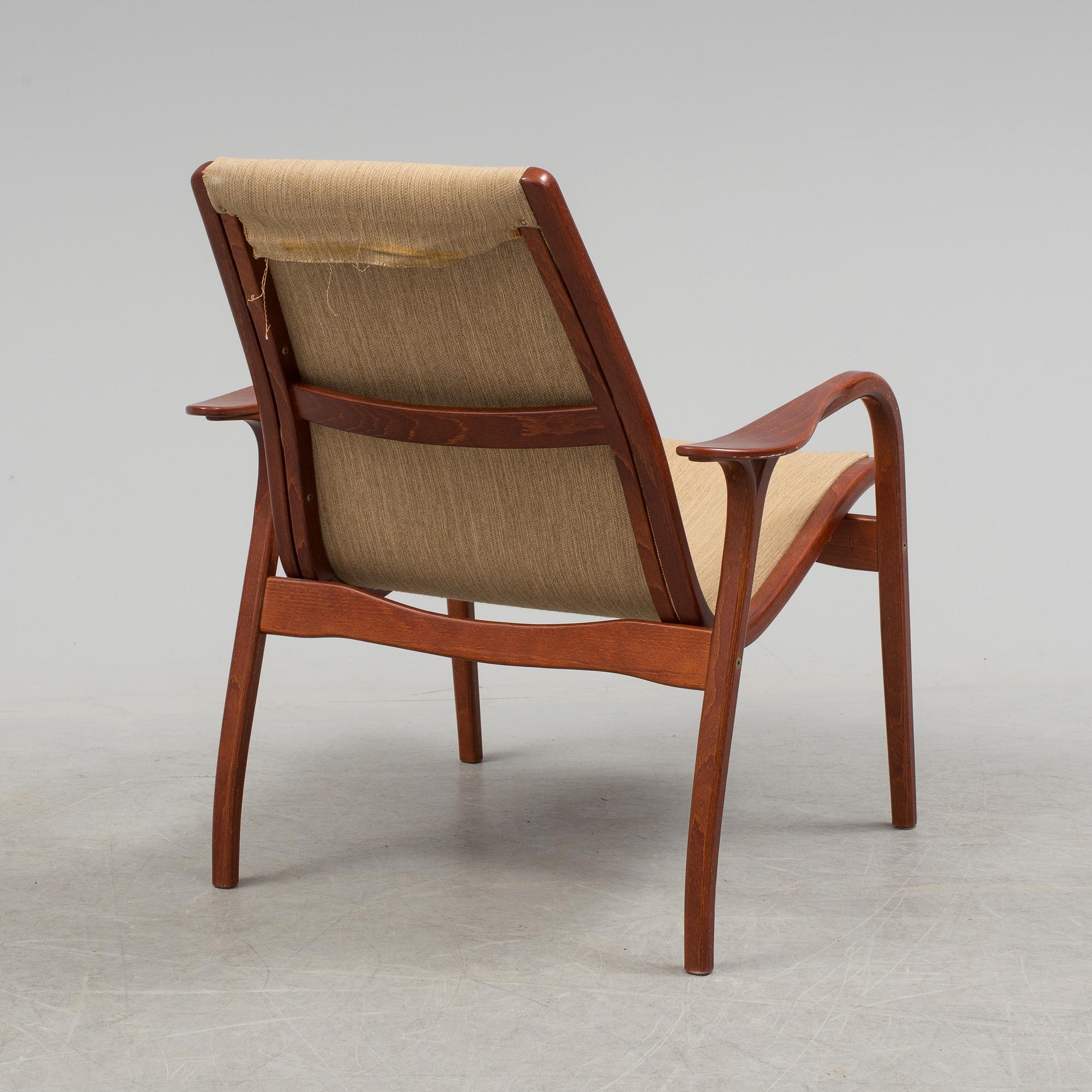 YNGVE EKSTRÖM, a "Kurva" armchair by Swedese.