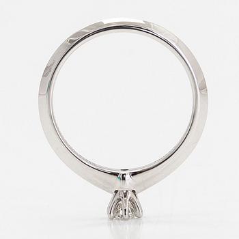 Tiffany & Co, a platinum ring with a diamond 0.19 ct. according to engraving.