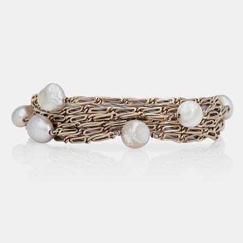 1136. A baroque probably natural saltwater pearl bracelet.