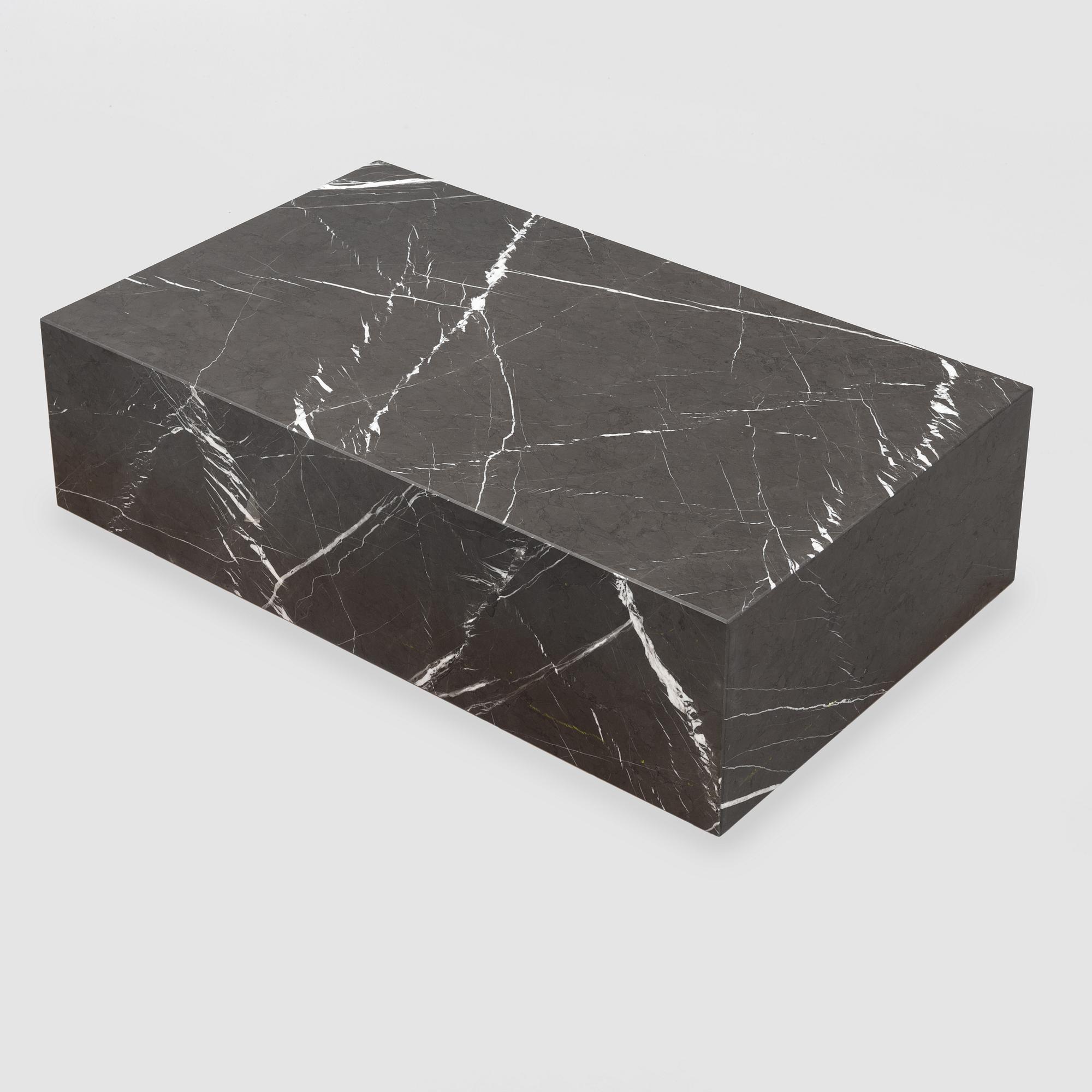 A marble 'Plinth' coffee table from Menu.