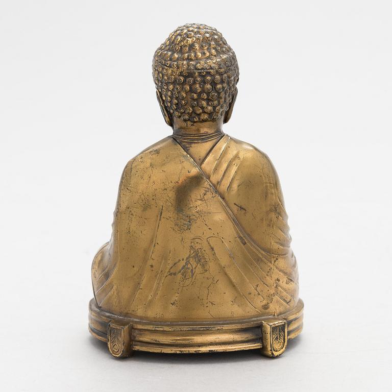 A late 20th-century Chinese figurine.