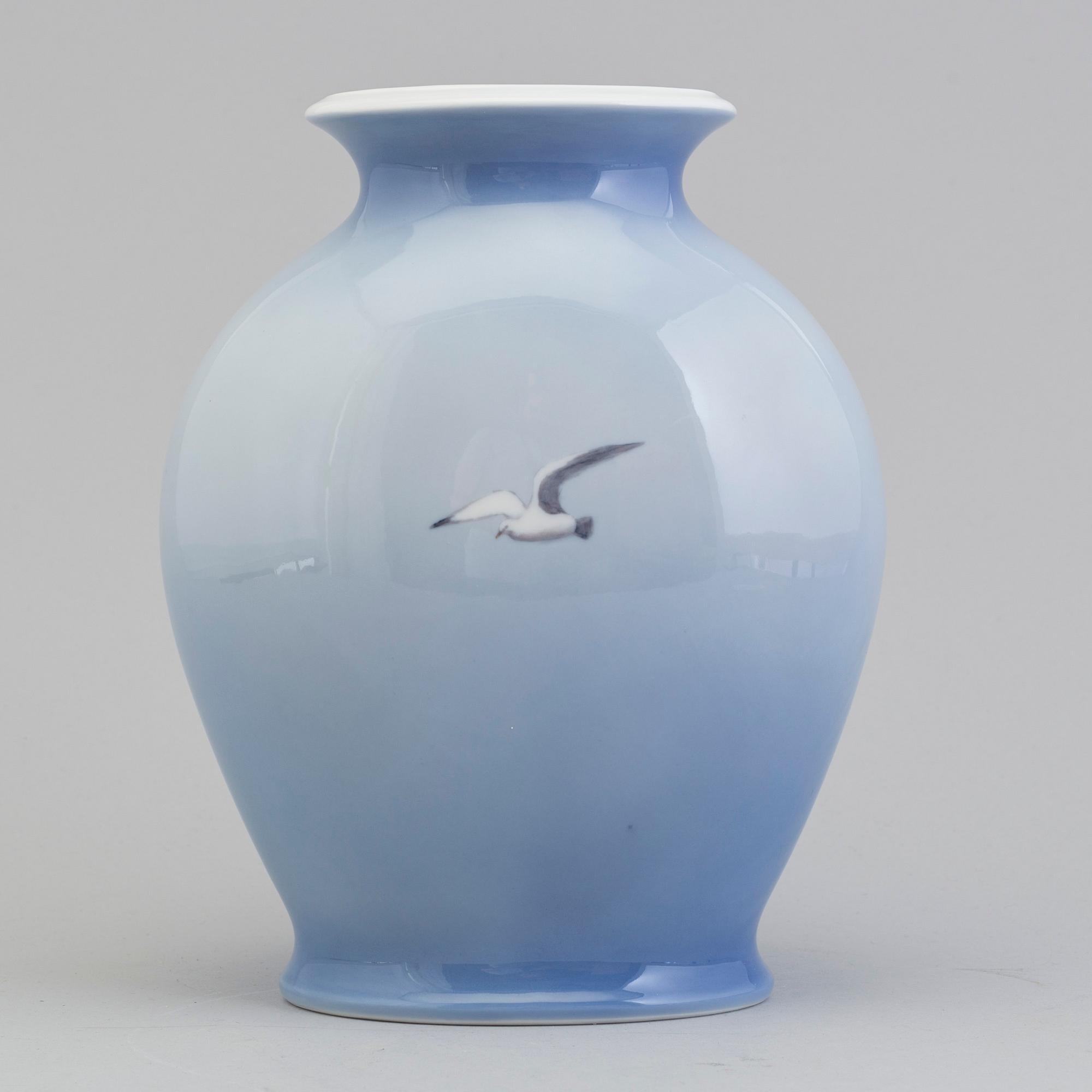 A porcelain vase by ROYAL COPENHAGEN.