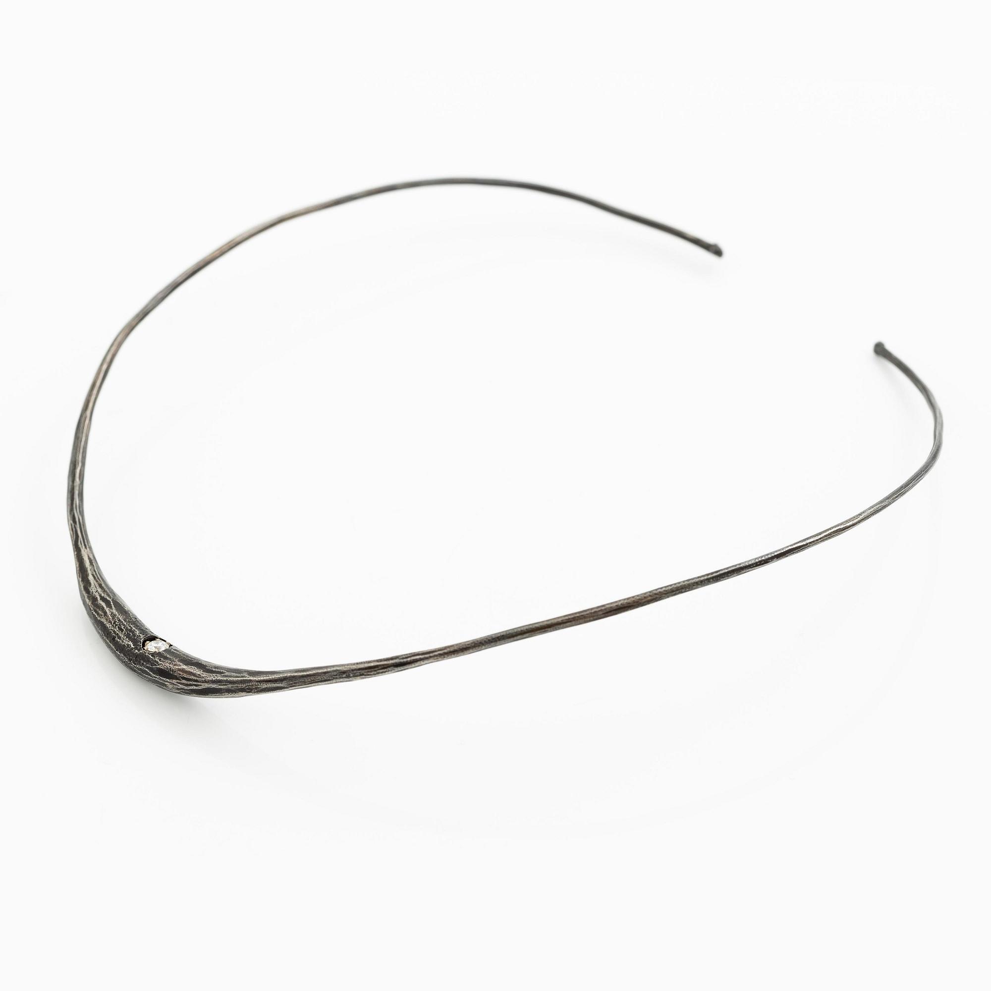 PA Lundahl-Terrs, a necklace and a bracelet, iron and round brilliant-cut diamonds.