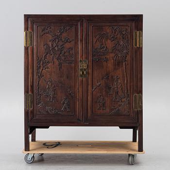 A hardwood cabinet, China, 20th century.