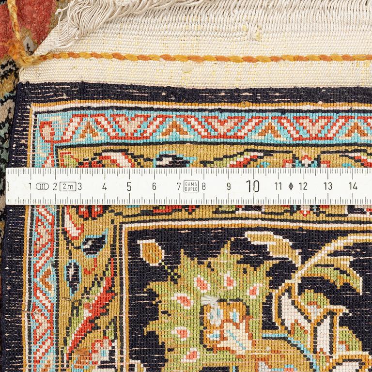 A rug, silk Quum, ca 160 x 106 cm.