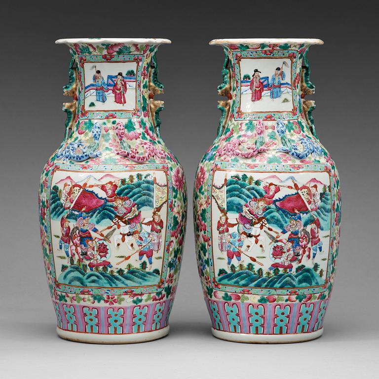 A pair of Canton famille rose vases, Qing dynasty, 19th Century.