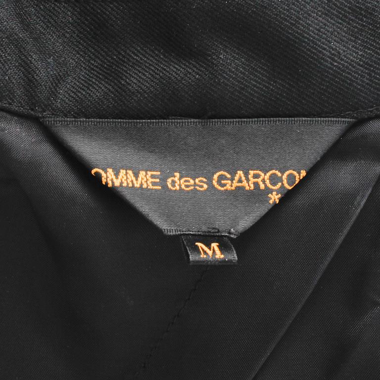 COMME DES GARÇONS, a black wool and lycra ladies suits jacket. Size m.