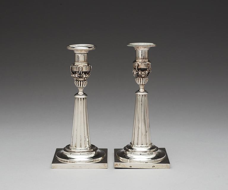 A pair of German 19th century silver candlesticks, makers mark of Johann Rudolf Haller, Augsburg 1801.